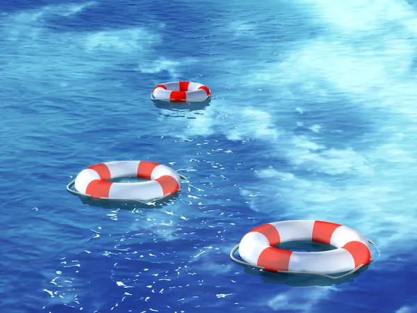 Tre salvagente, galleggianti sulle onde — Foto Stock