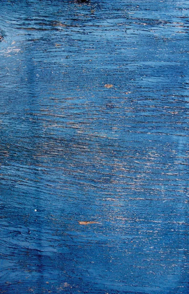 Текстура - треснувшая краска на деревянной поверхности — стоковое фото