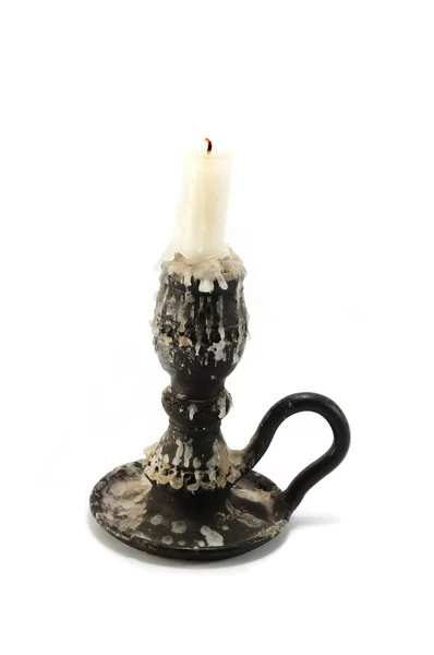 Vecchio candeliere nero isolato — Foto Stock