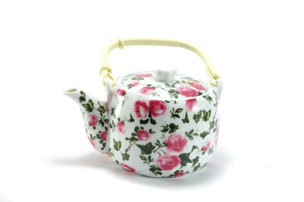 Teekanne mit floralem Ornament auf weißem Hintergrund — Stockfoto