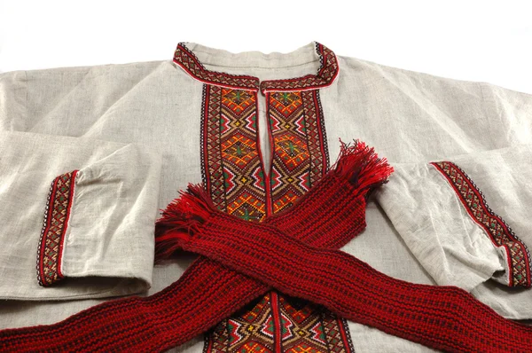 Traditional ukrainian male clothes - embroidered shirt and red — Stock Photo, Image