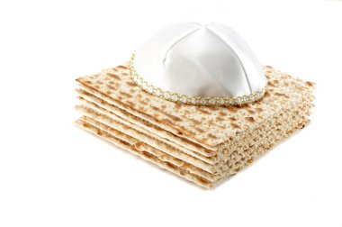 Jewish Passover holiday still life with matzoh and kippah clipart