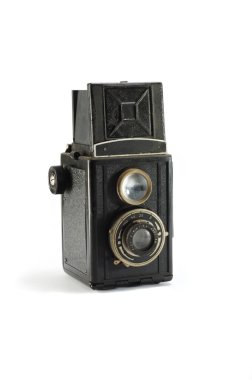 Old film photo camera on white background clipart