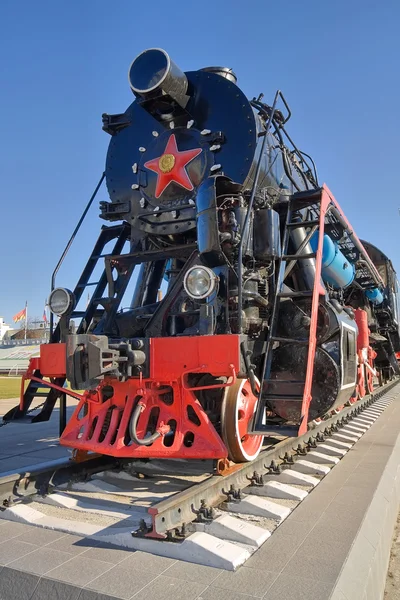 Ancient steam locomotive with red star — Stock Photo, Image