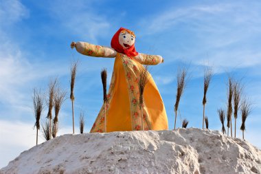 End of the winter. Shrovetide. Big doll for the burning clipart