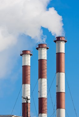 Lots of smoking chimneys other blue sky clipart