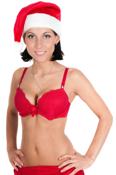 Porträt einer schönen Frau mit rotem Weihnachtsmann-Hut — Stockfoto
