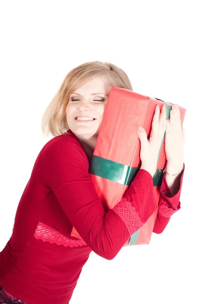 Счастливая женщина с рождественскими подарками — стоковое фото