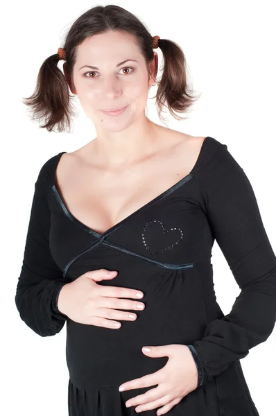 Porträt einer hübschen Schwangeren im schwarzen Kleid — Stockfoto