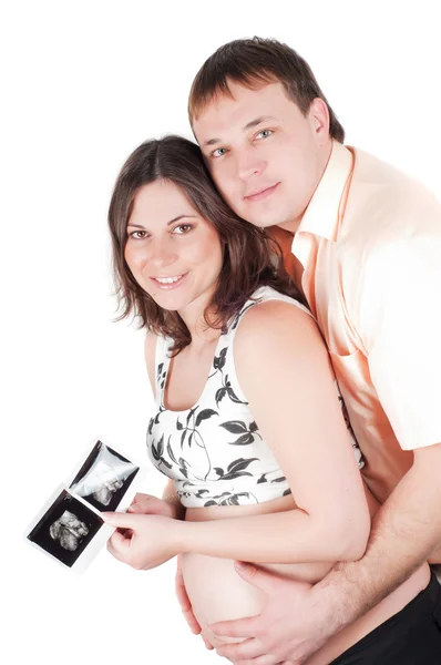 Par hålla ett sonogram av deras barn — Stockfoto