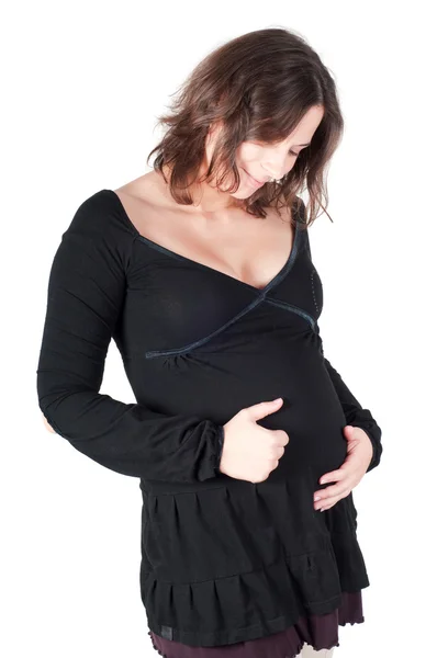 白で隔離される黒のドレスでかなり妊娠中の女性の肖像画 — ストック写真