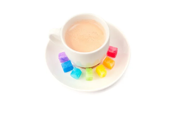 Losas multicolores de shugar y taza de café — Foto de Stock