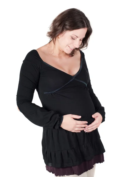 Porträtt av ganska gravid kvinna i svart klänning — Stockfoto