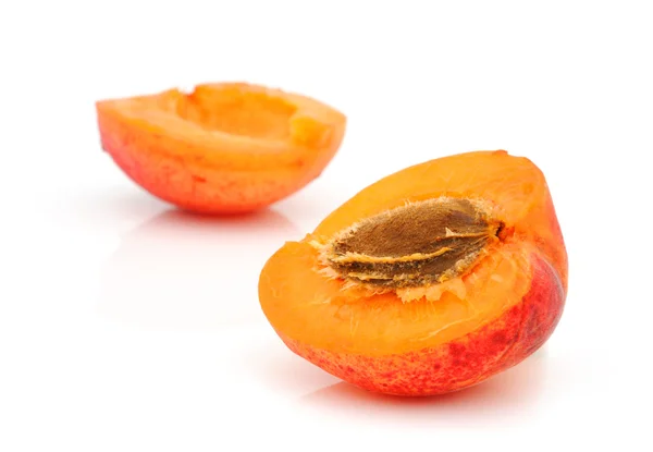 Ripe apricot with a stone — Stock Photo, Image