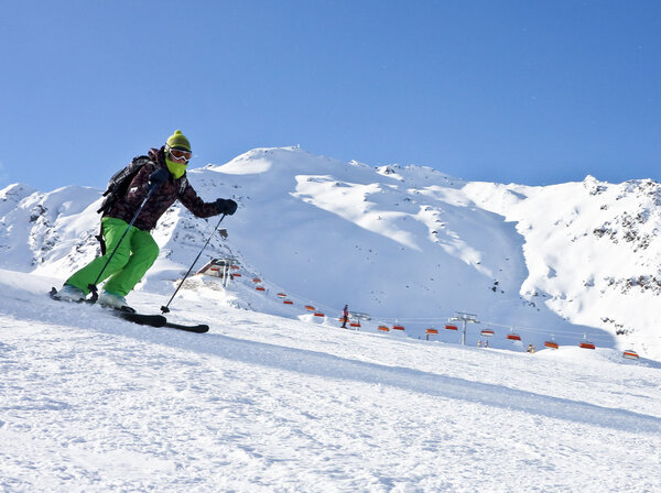 The woman is skiing at a ski resort Solden