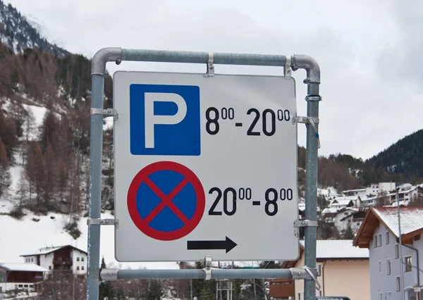 stock image A road sign with the time constraints