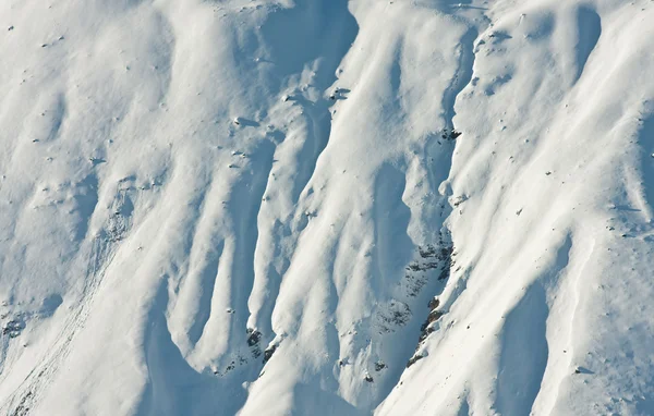 山の斜面は雪で覆われています。バック グラウンド — ストック写真