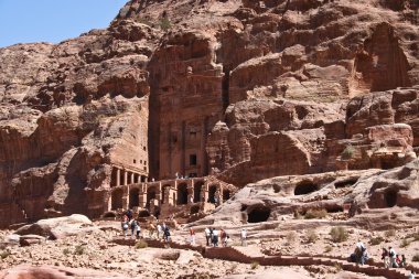 Petra in Jordan - city carved out of the rock clipart