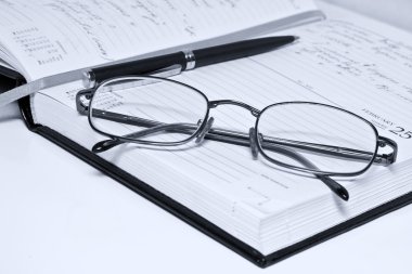 Pen glasses and notebook clipart