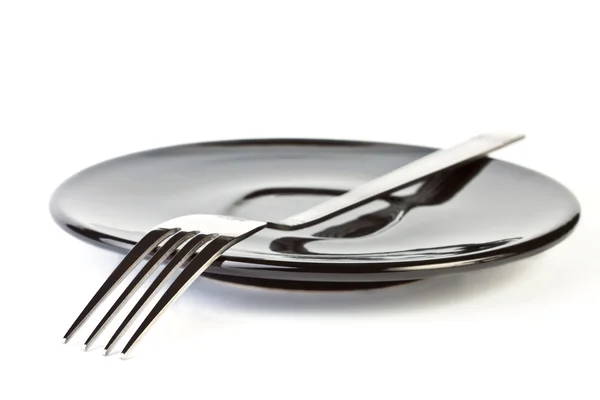 Fork on plate — Stock Photo, Image