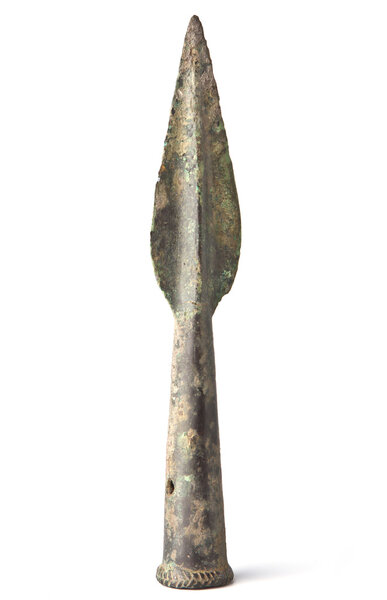Ancient bronze spear on white background