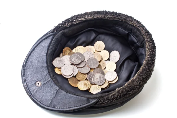 Coins in old cap — Stock Photo, Image