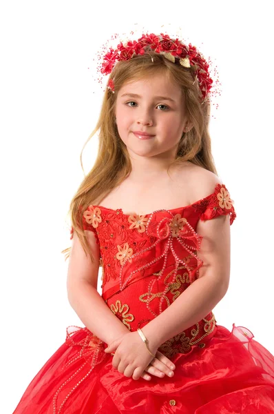 Tiener meisje in een rode jurk — Stockfoto