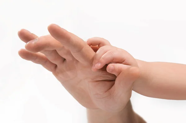 Férfi és gyermek kezét — Stock Fotó