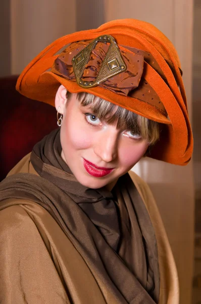 Young woman in an elegant hat — Stock Photo, Image