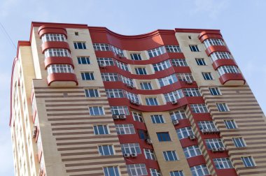 New high-rise building of housing complex clipart