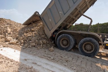 Body of the car carrying industrial materials in the process clipart