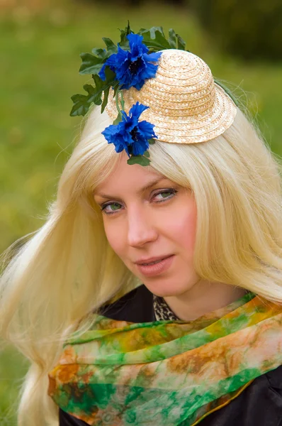 Attractive woman with a beautiful headdress — Stock Photo, Image
