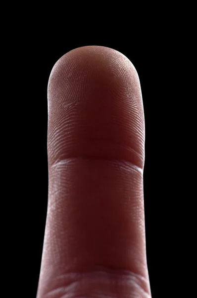 Menschlicher Finger Auf Schwarzem Hintergrund — Stockfoto