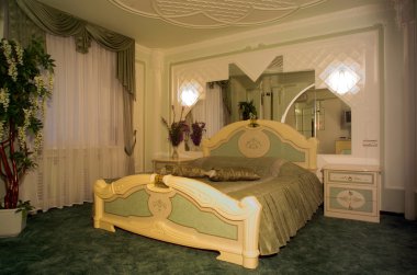 Bedroom with king size bed clipart