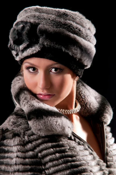 Woman in a fur hat — Stock Photo, Image