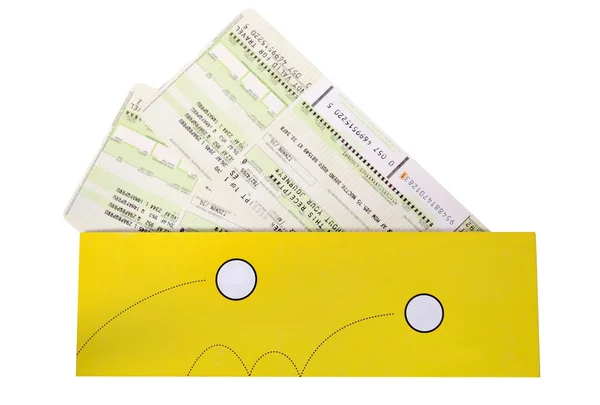 stock image Airtickets to yellow envelope