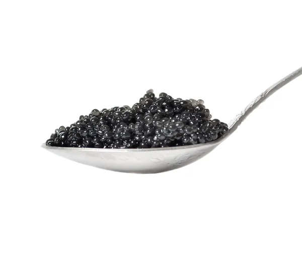 Schwarzer Kaviar im Löffel Stockbild