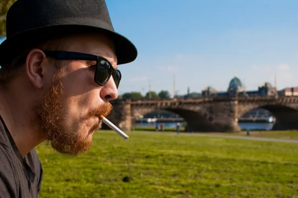 Profile man with a cigarette — Stock Photo, Image