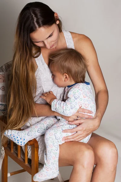 Beauty woman with a little son — Stock Photo, Image