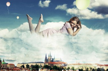 Beauty woman near the clouds clipart