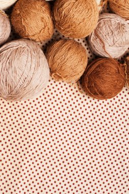Pattern with pile of brown yarn clipart