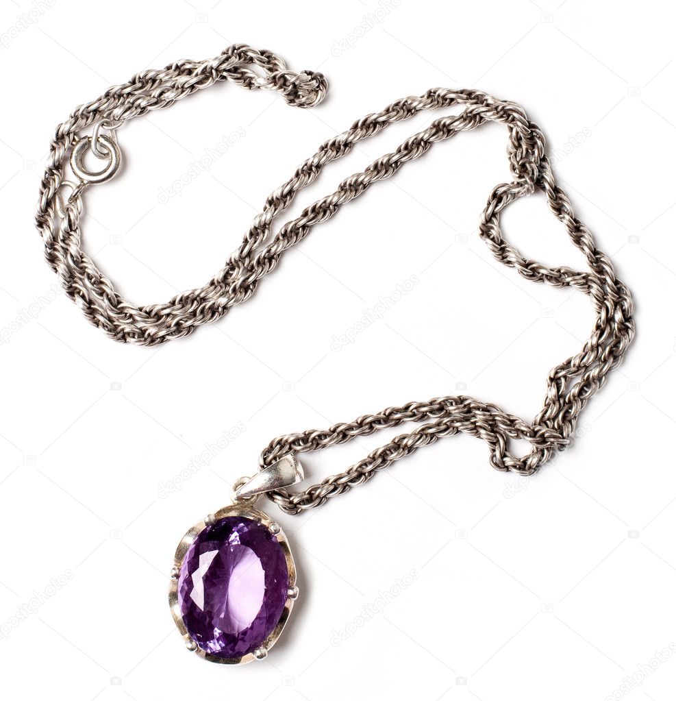 Retro antiques pendant with violet stone (isolated on a white)