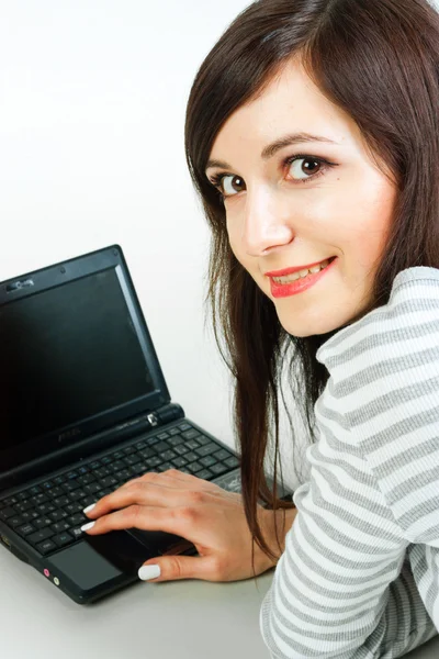 有手提电脑的女孩 免版税图库图片