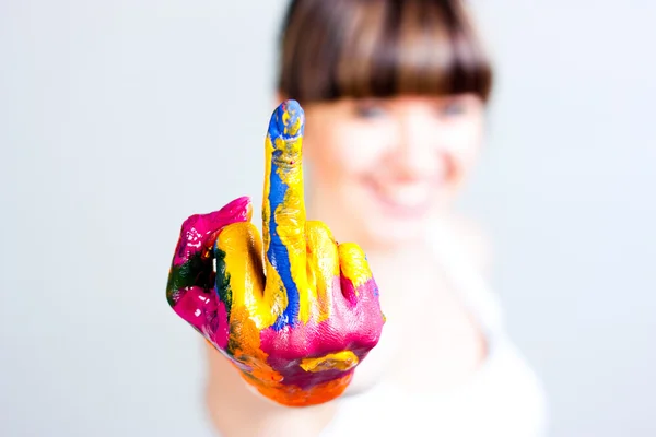En pige med farvede hænder Stock-foto