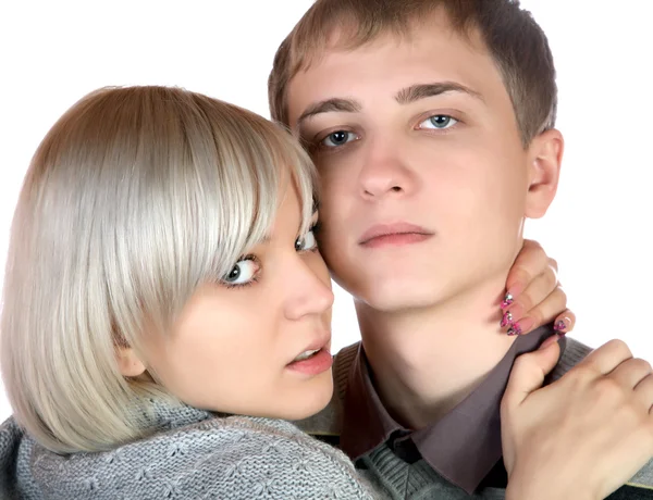 The girl embraces the young man — Stock Photo, Image