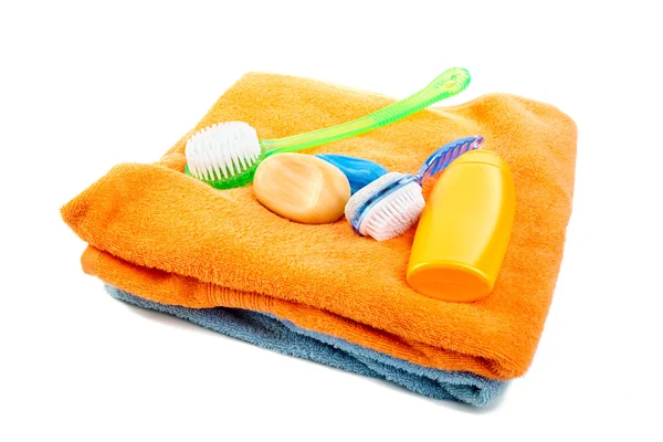 Gewassen shampoo badhanddoek en borstels — Stockfoto