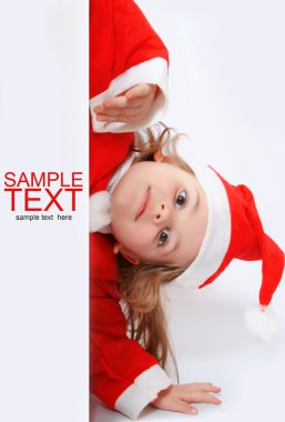 Little girl in Santa's hat clipart