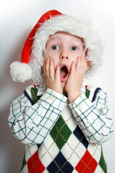 Santa kalap, fiú mosolyogva — Stock Fotó