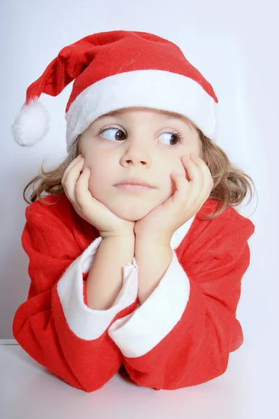 Menina no chapéu do Pai Natal — Fotografia de Stock