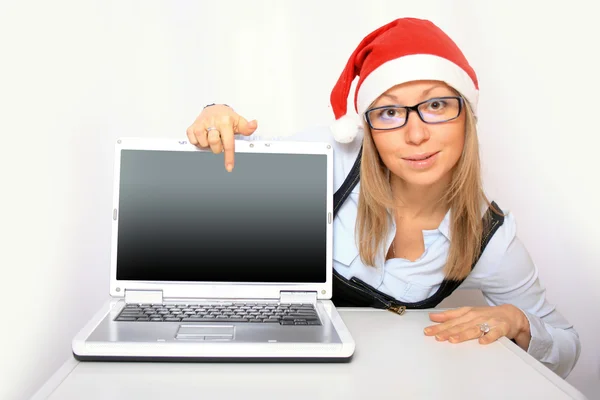 Geschäftsfrau mit rotem Weihnachtsmann-Hut — Stockfoto